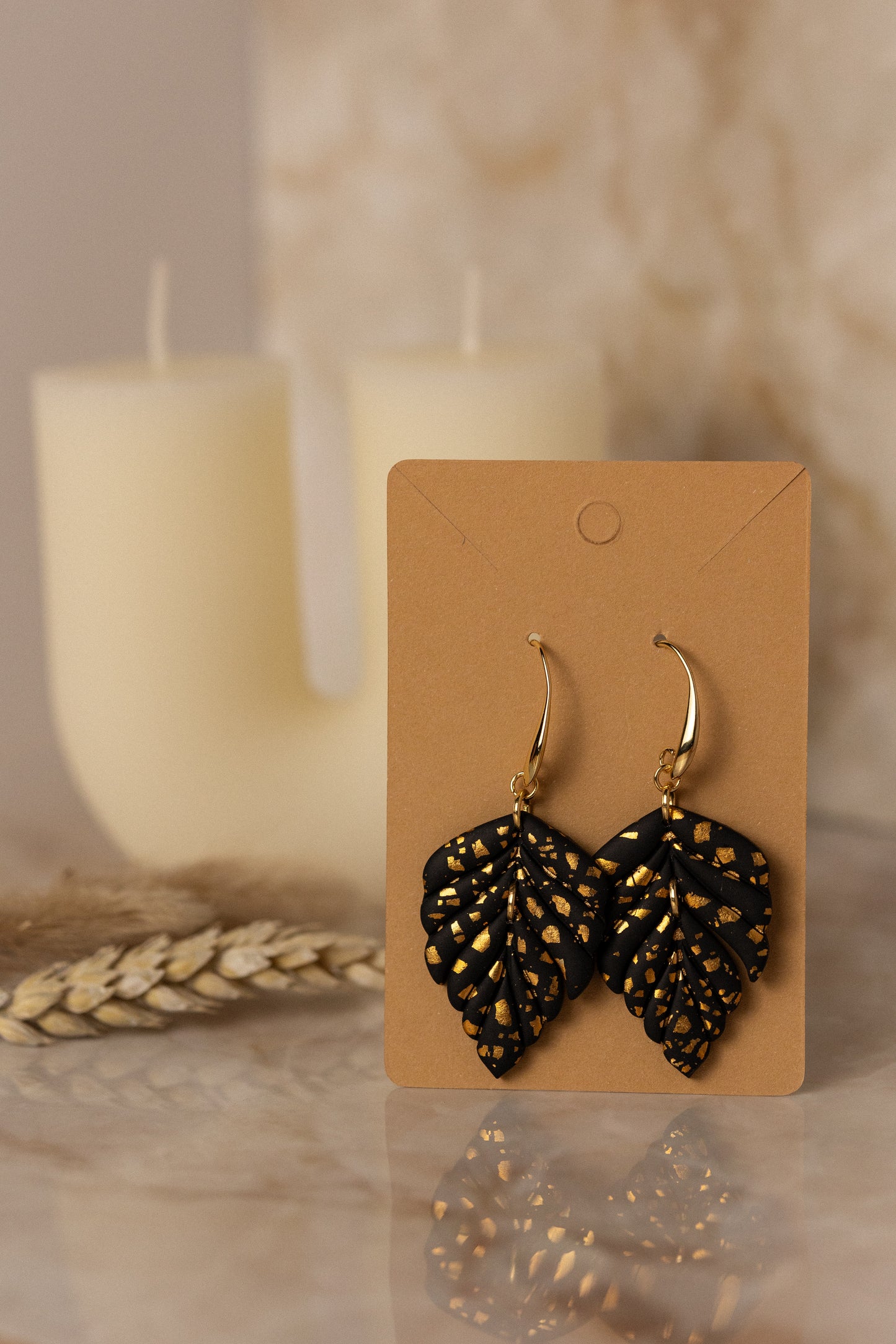 Prairie Rose Clay - Black & Gold Tiered Leaf Earrings